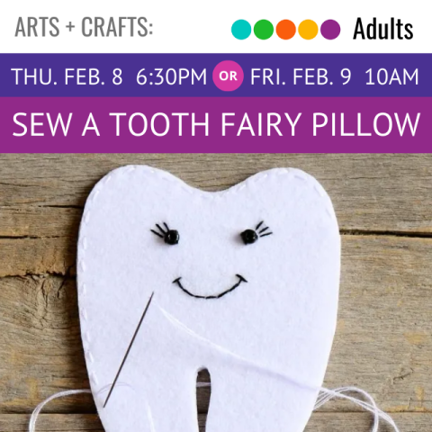 a white pillow shaped like a tooth with a smiling face