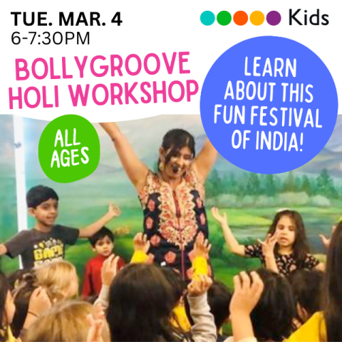 Indian presenter with arms held high surrounded by a group of children dancing.