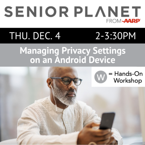 A man is looking at his mobile phone.