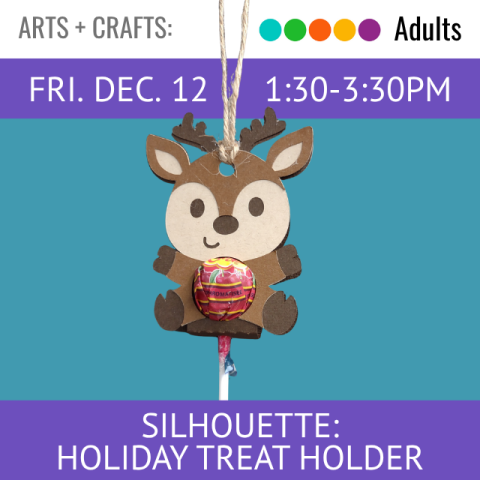 A paper reindeer is holding a chocolate treat.