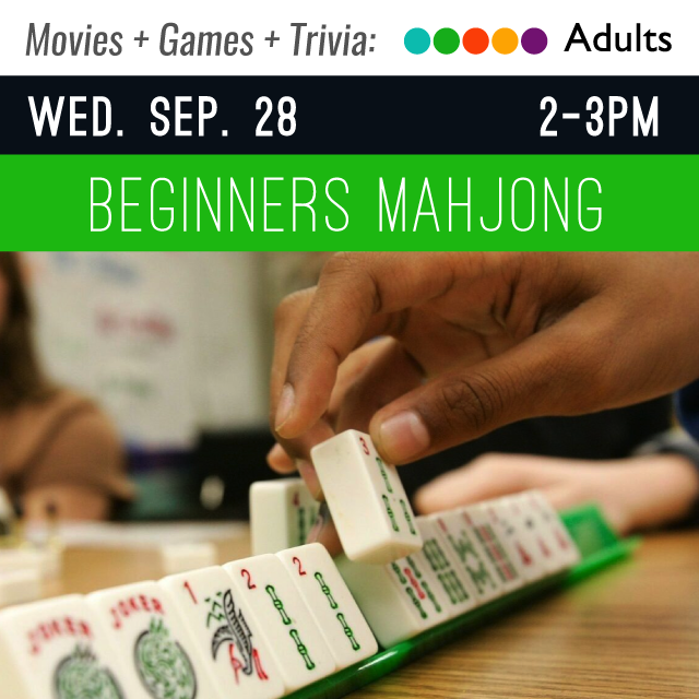 image of a hand with mahjong tiles