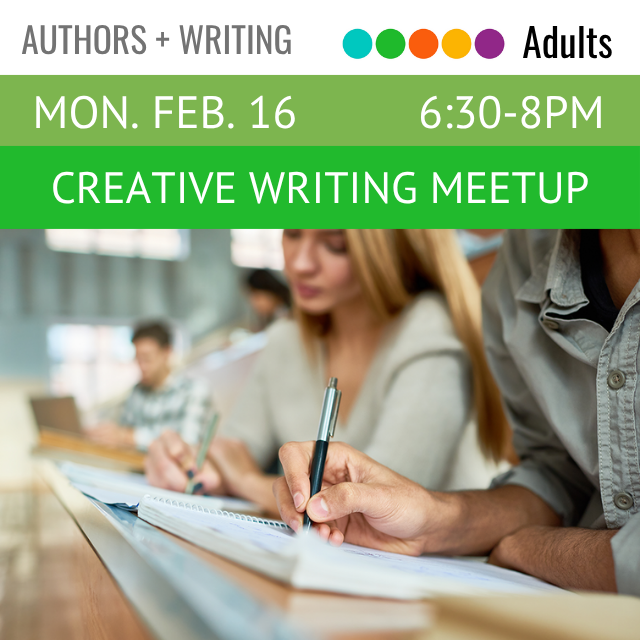 Two people are sitting at a table and writing.